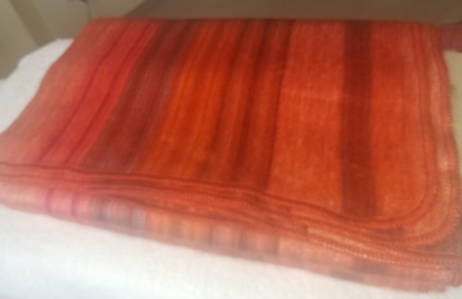 Alpaca blanket orange stripes